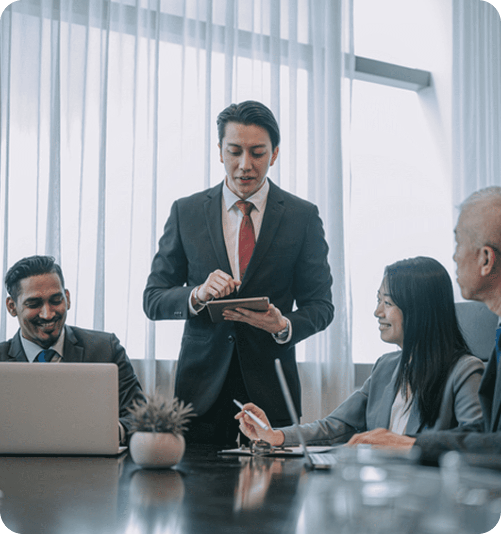 Team collaboration around conference table