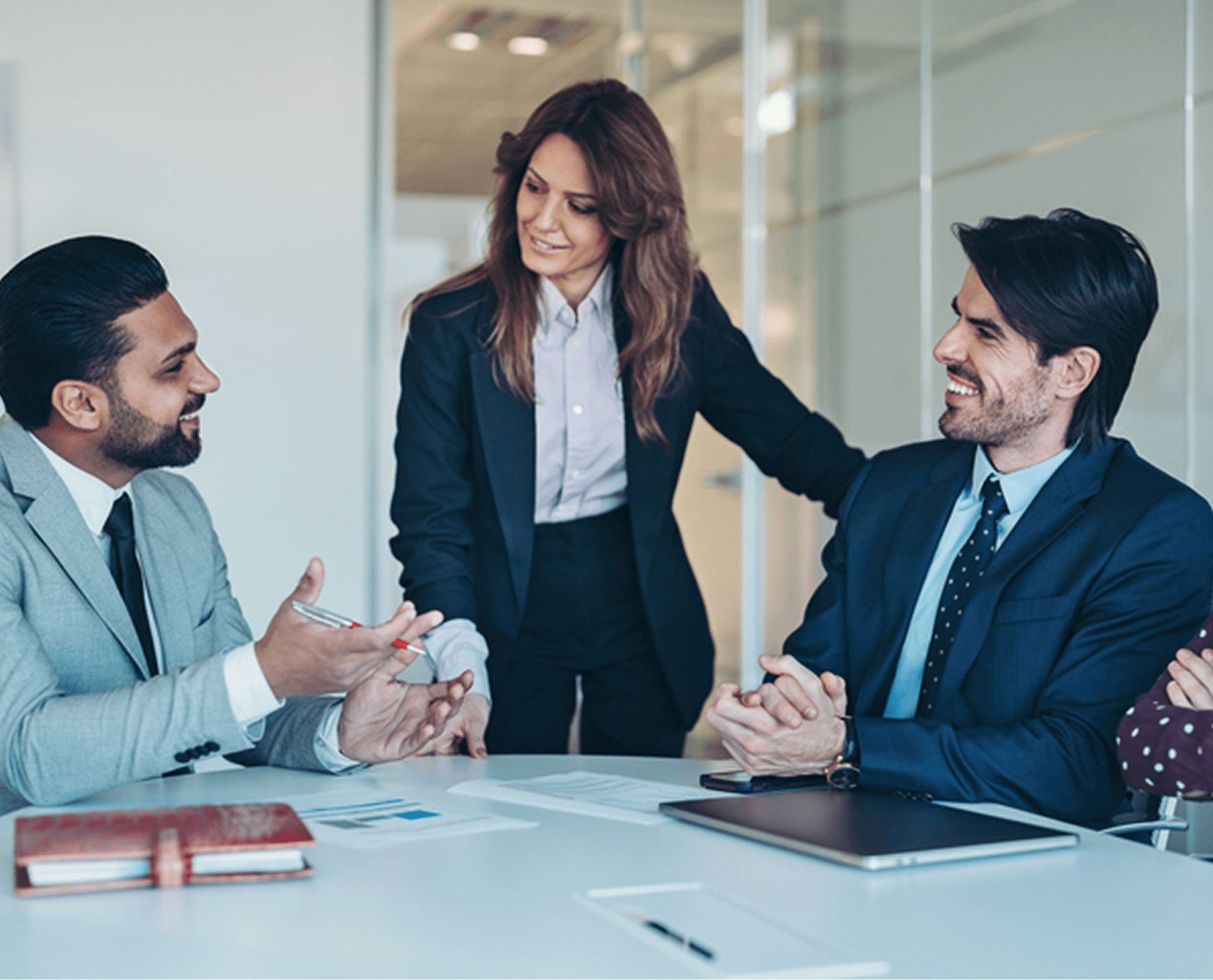 Team collaboration around conference table